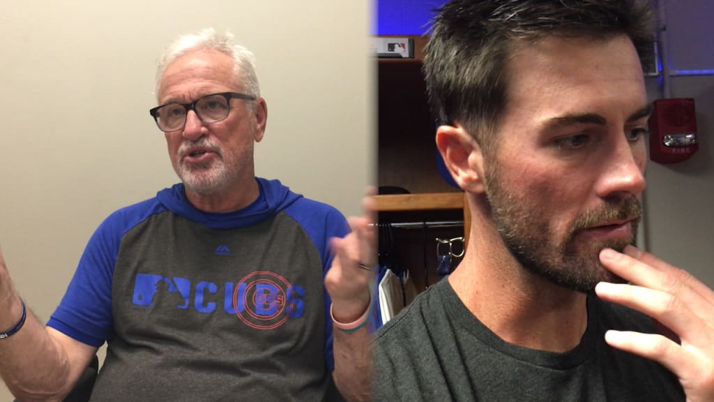 What does a catcher discuss with Cole Hamels on the mound? Hair