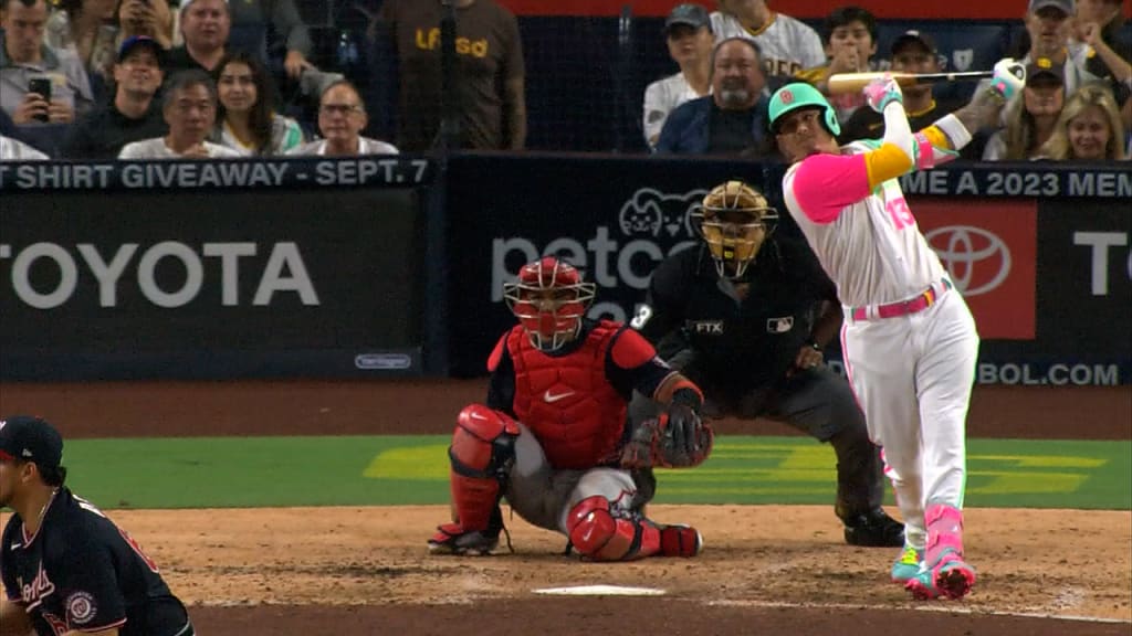 Shohei Ohtani of the Los Angeles Angels puts on pink cleats to