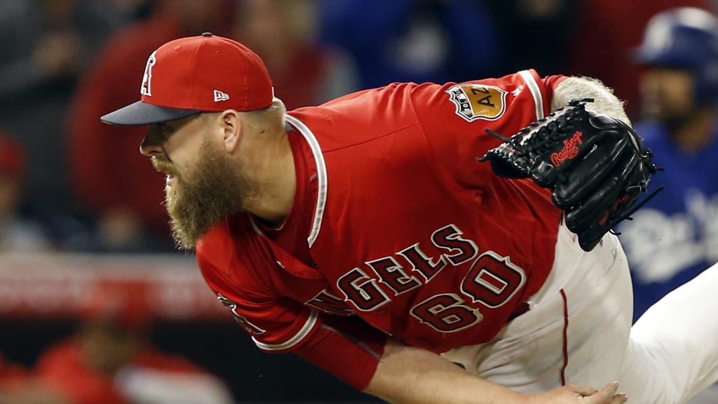 Los Angeles Angels pitcher Justin Miller throws to the plate against the Los Angeles Dodgers during the ninth inning of a baseball game in Anaheim, Calif., Thursday, March 30, 2017. (AP Photo/Alex Gallardo)