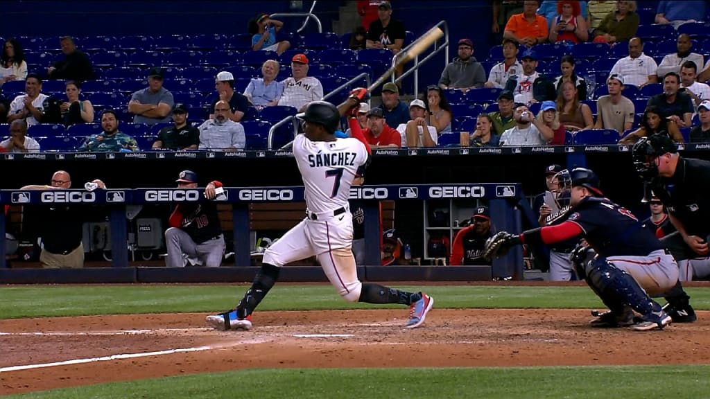 Marlins outfielder Juan Pierre bunting for a hit.