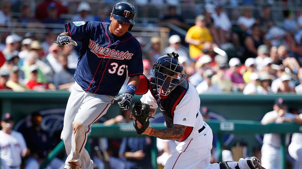 Blake Swihart tags out Wilfredo Tovar, who tried to score on a dribbler back to the mound in the fourth. (Getty)