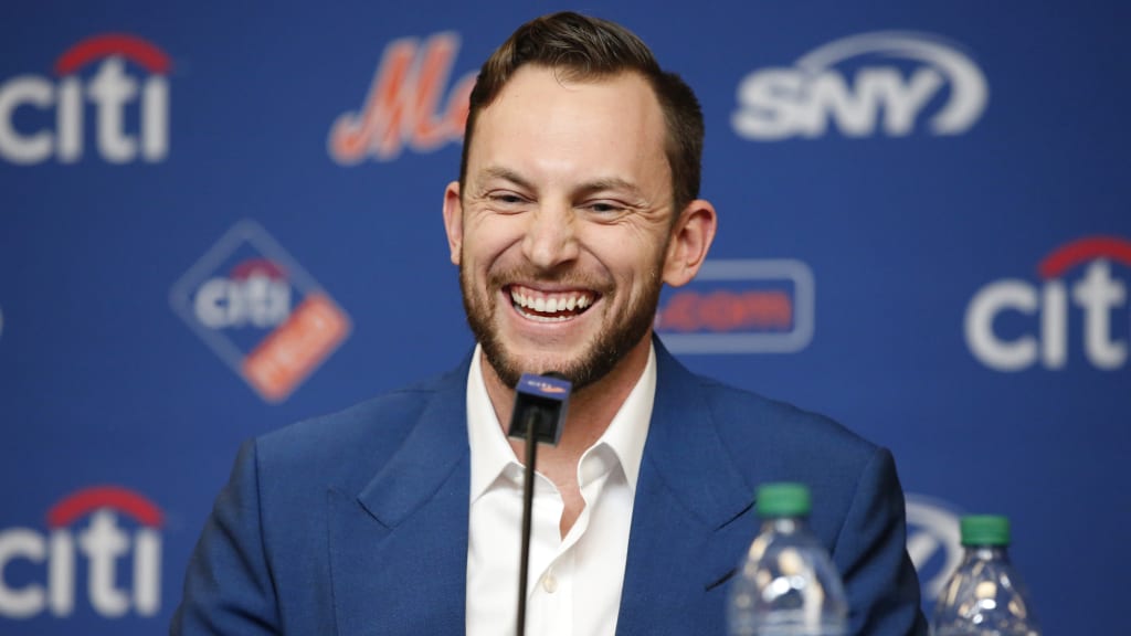 Newly signed New York Mets All-Star infielder Jed Lowrie laughs during a press conference introducing him to the media, Wednesday, Jan. 16, 2019, in New York. (AP Photo/Kathy Willens)