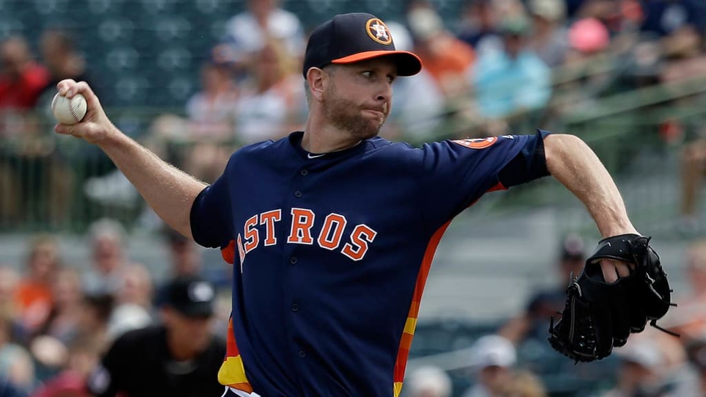 Scott Feldman has been experimenting with a different changeup grip in Spring Training. (AP)