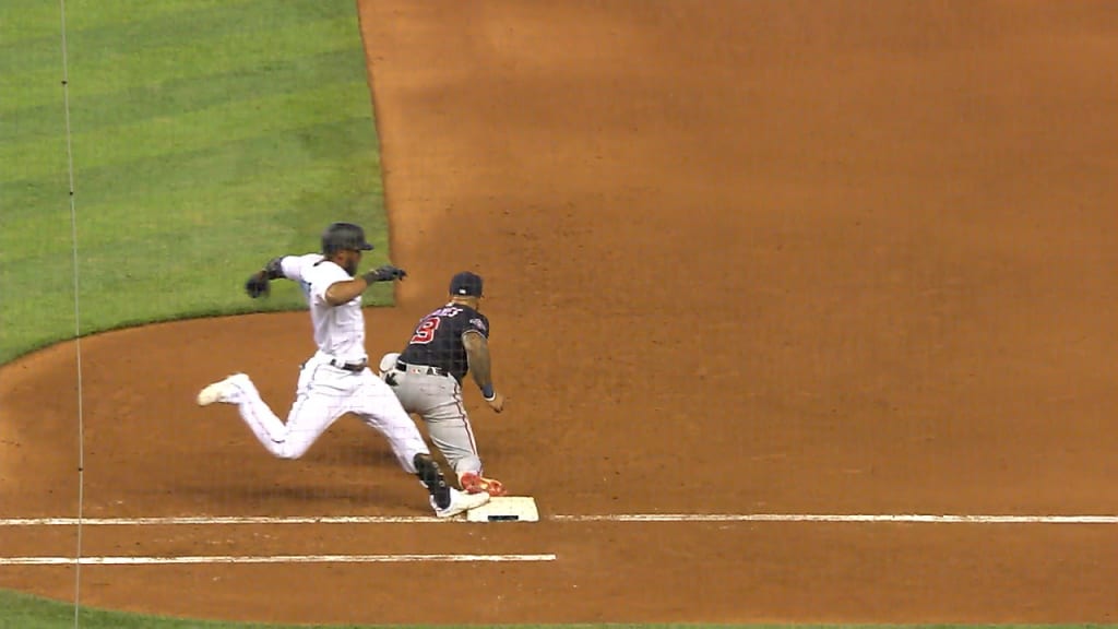 Monte Harrison scores on error
