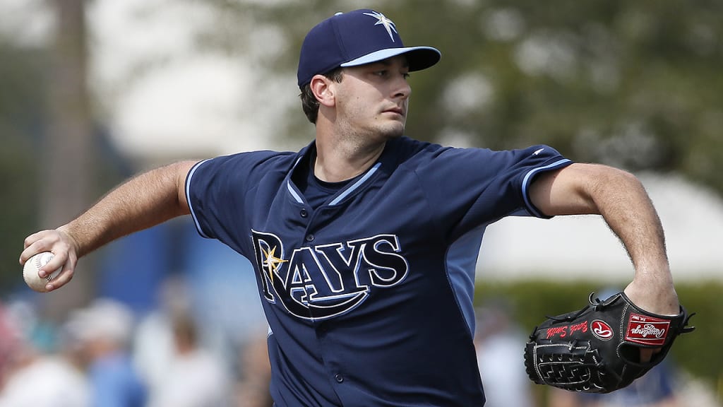 Tampa Bay Rays' Burch Smith throws batting practice at baseball spring training in Port Charlotte Fla., Saturday Feb. 28, 2015. (AP Photo/Tony Gutierrez)