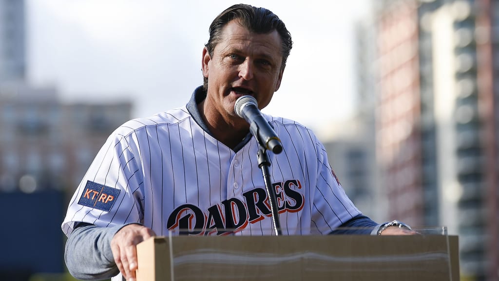 Former San Diego Padres relief pitcher Trevor Hoffman speaks to the crowd with the 1998 National League Championship team to induct former Padres General Manager Kevin Towers into the Padres Hall of Fame, prior to the Padres' baseball game against the St. Louis Cardinals in San Diego, Saturday, May 12, 2018. (AP Photo/Kelvin Kuo)