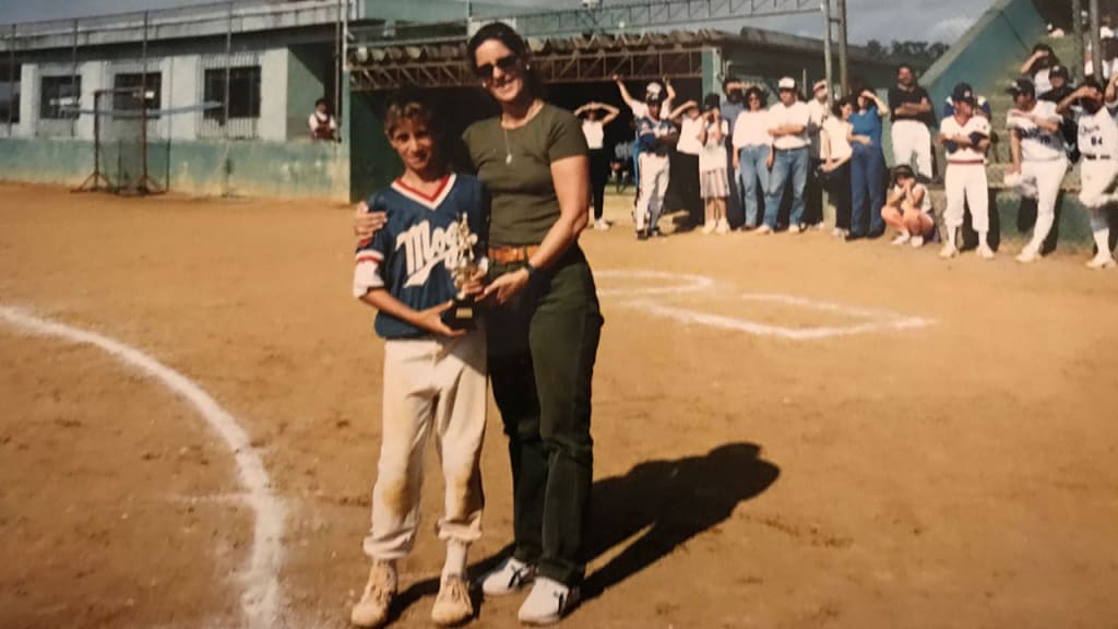 Yan Gomes with his mom in Brazil. Gomes is the first Brazilian-born player to play in the Major Leagues.