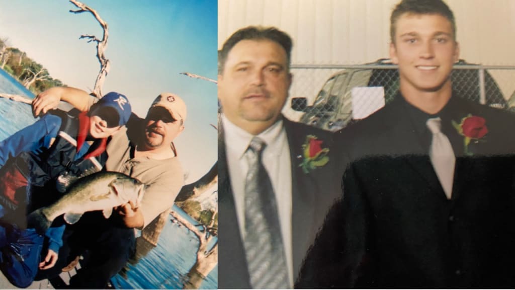 Tyler Naquin with his father, Ken