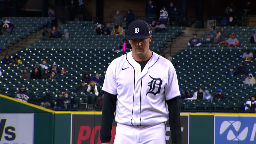 action photo of kyle funkhouser pitching, in uniform