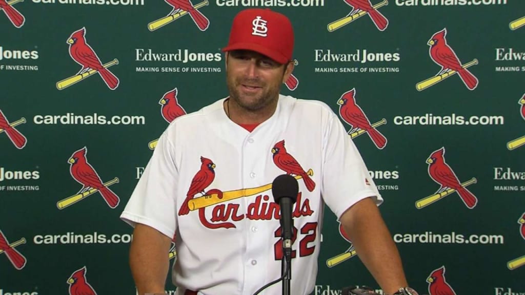 St. Louis Cardinals manager Mike Matheny and Mark McGwire watch