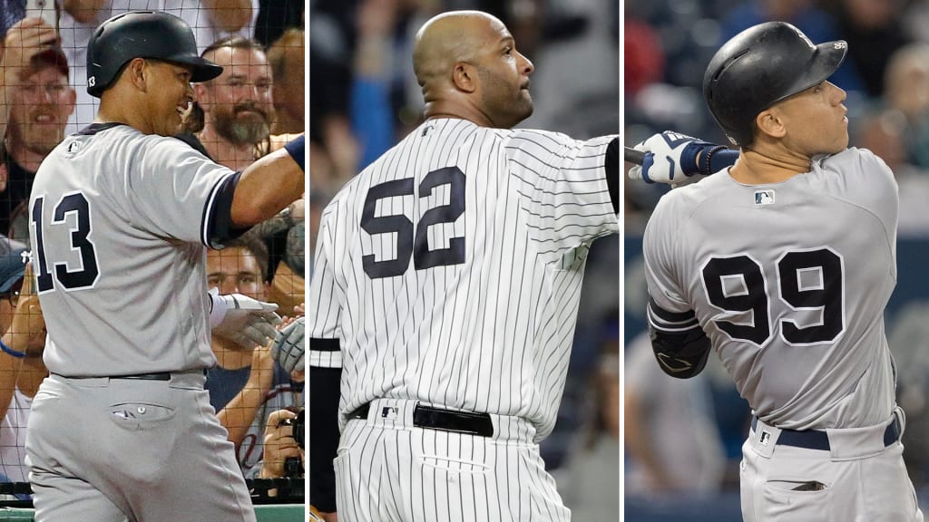 How did the tradition of the Yankees not wearing names on their