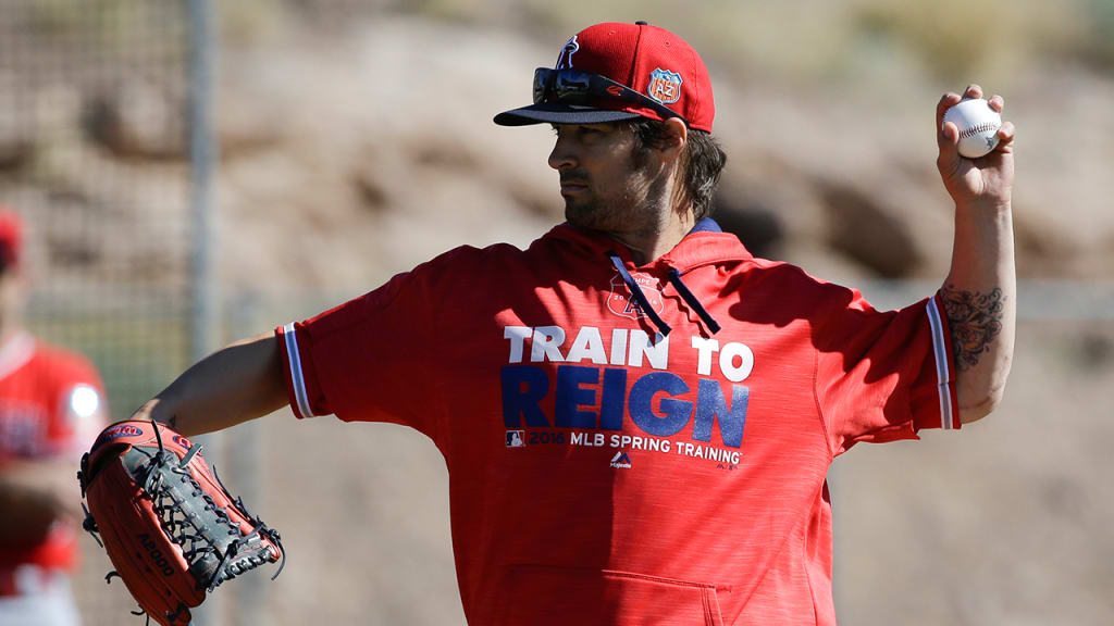 C.J. Wilson felt tightness in his left biceps during a bullpen session on Saturday. (AP)
