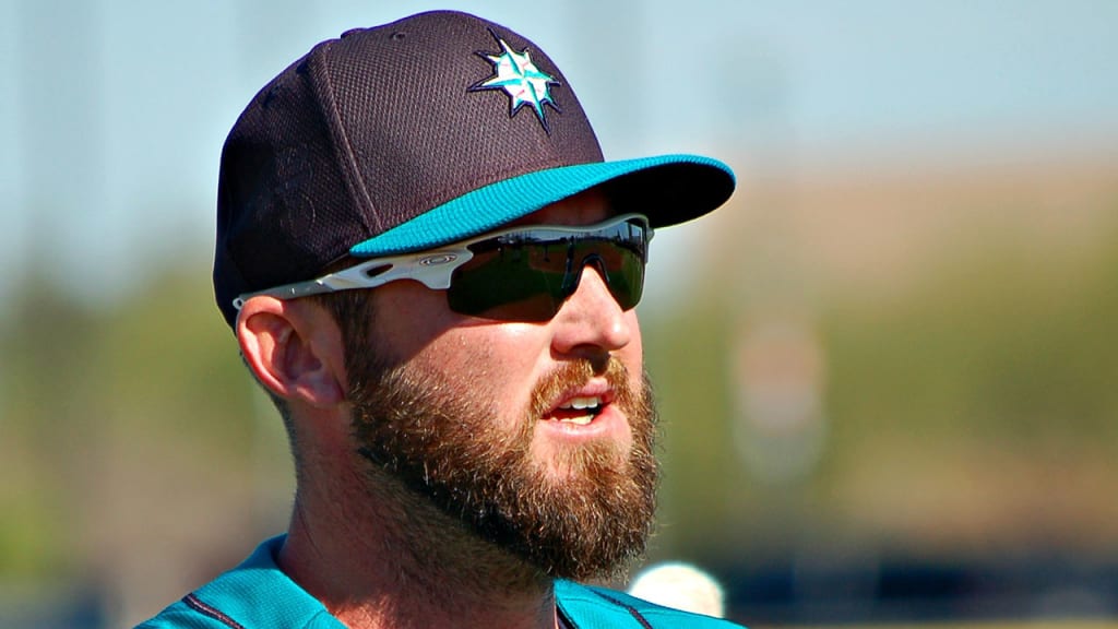 Right-hander Ryan Cook, who signed a one-year deal with Seattle, is competing for a spot in the bullpen.