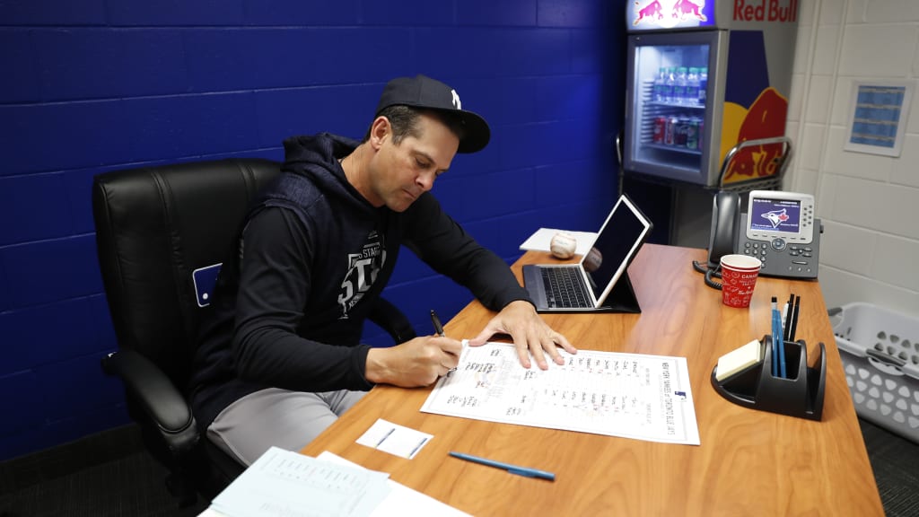 Aaron Boone filling out his first lineup card at Toronto’s Rogers Centre