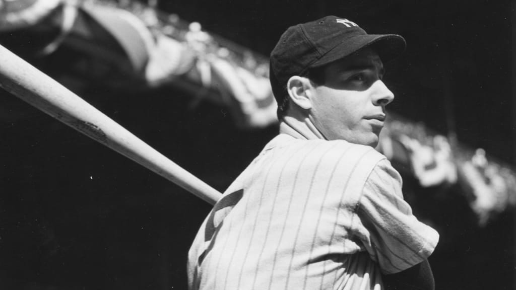 American baseball player Joe Dimaggio (1914 - 1999) of the New York Yankees swings a bat, mid 20th century. (Photo by PhotoQuest/Getty Images)