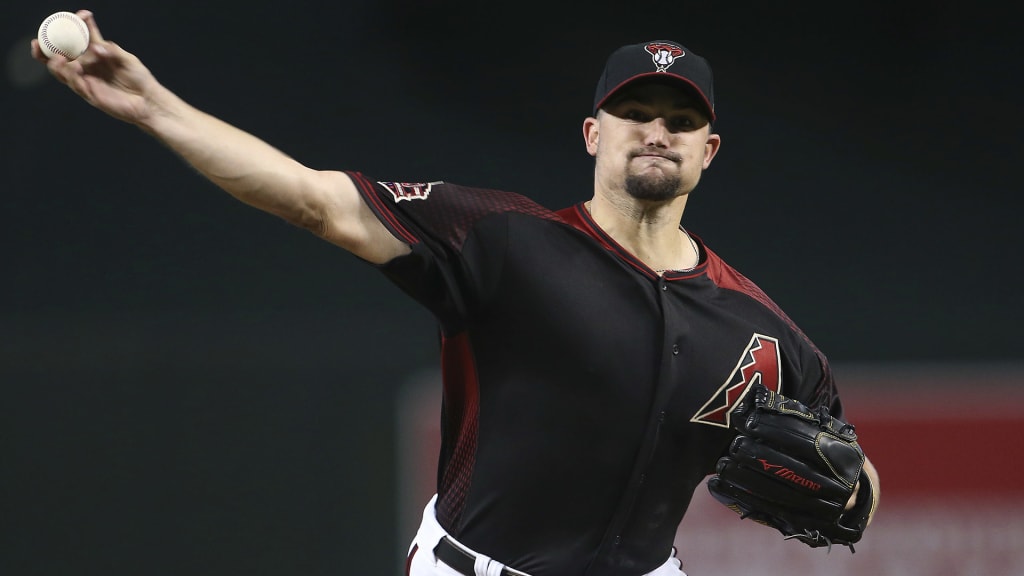 Arizona Diamondbacks starting pitcher Zack Godley throws against the Colorado Rockies during the first inning of a baseball game, Saturday, July 21, 2018, in Phoenix. (AP Photo/Ralph Freso)