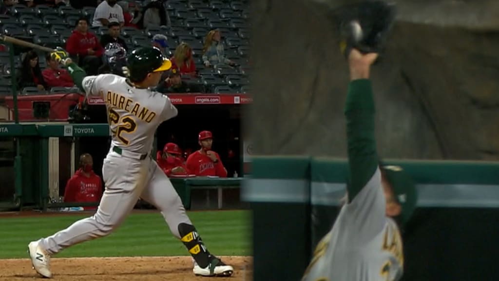 Laureano gets four hits, robs HR