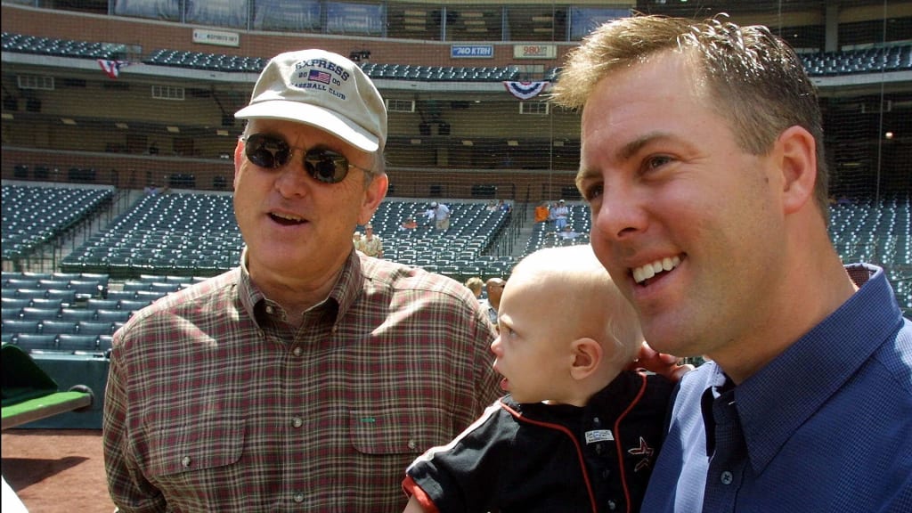 Hall of Fame pitcher Nolan Ryan, left, grandson Jackson Ryan, 1, and son Reid Ryan, right, General Manager of the minor league Round Rock Express, are shown before the Houston Astros hosted the Express in an exhibition game at Enron field in Houston Sunday April 1, 2001. (AP Photo/Richard Carson)