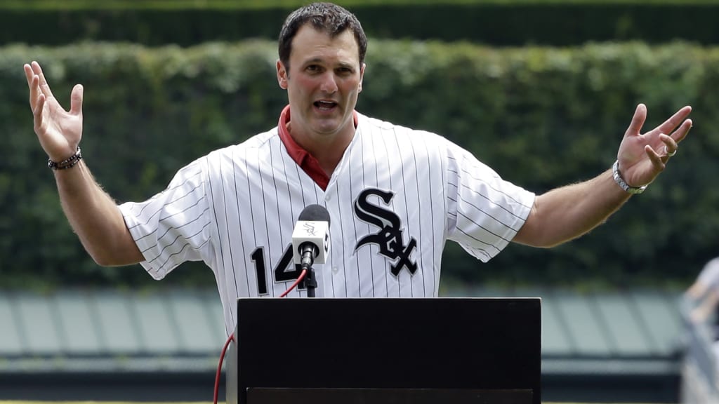 Former Chicago White Sox player Paul Konerko speaks to the crowd during a ceremony honoring the 10th anniversary of the 2005 World Series Champion Chicago White Sox team before a baseball game between the Kansas City Royals and the Chicago White Sox Saturday, July 18, 2015, in Chicago. (AP Photo/Nam Y. Huh)