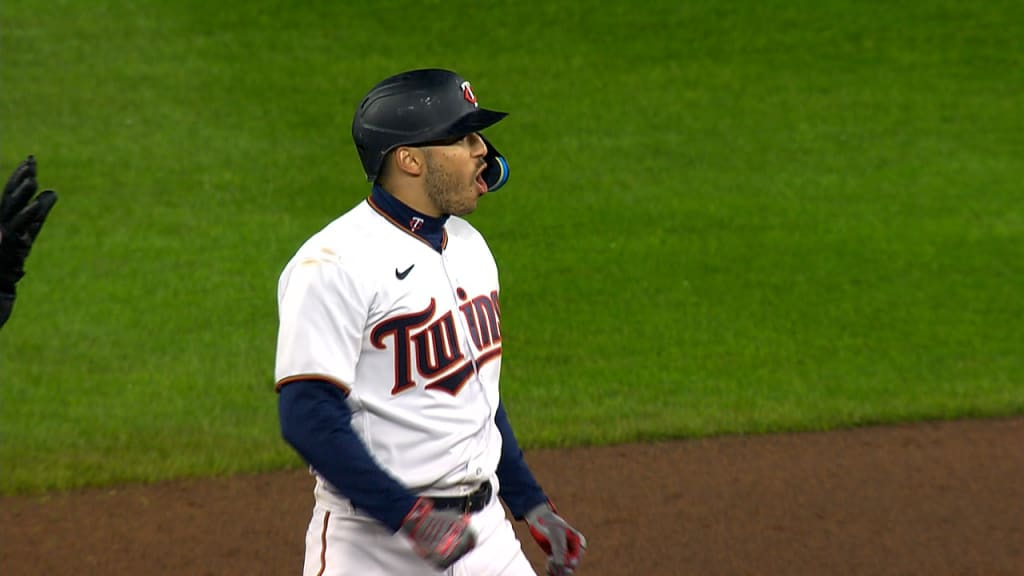 Minnesota Twins' Carlos Correa and Daniella Correa await the