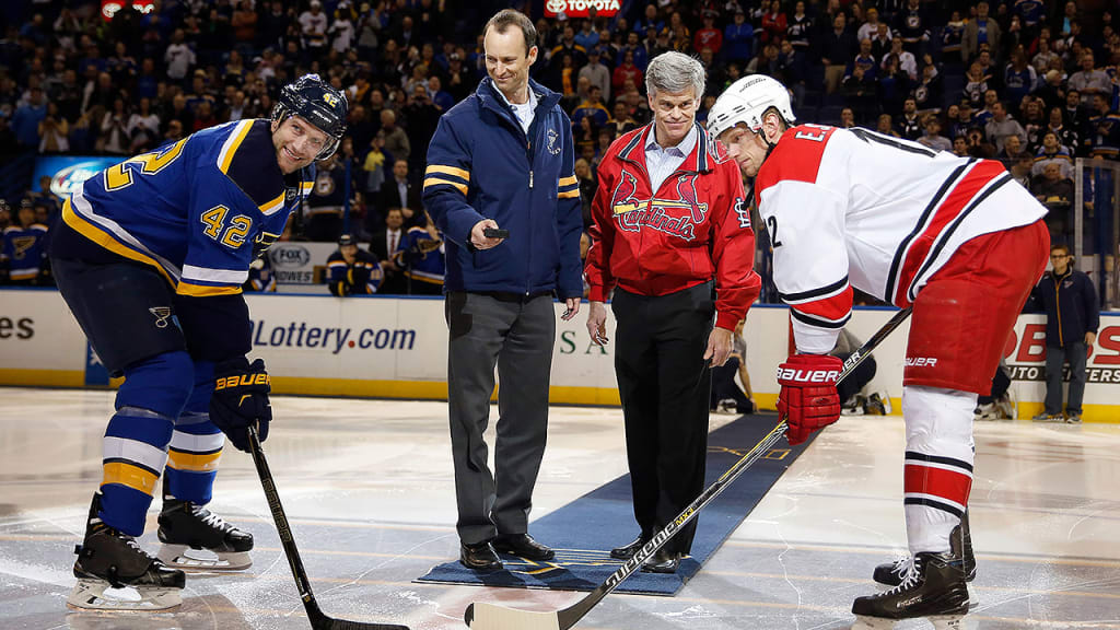 Bill DeWitt III joined the Blues' Tom Stillman in a ceremonial puck drop (AP).
