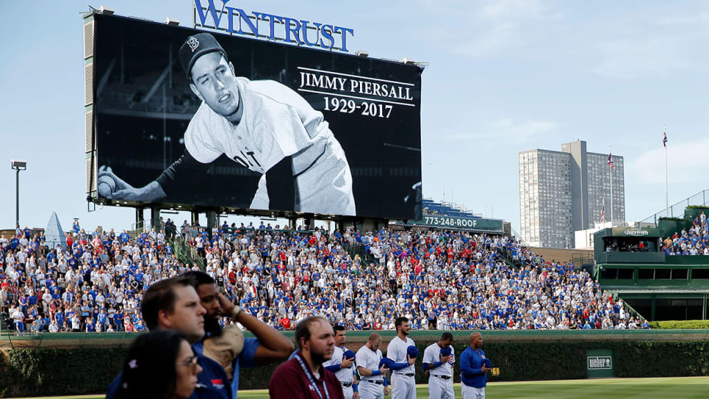 The Cubs hold a moment of silence for Jimmy Piersall before Sunday night's game at Wrigley Field. (Getty)