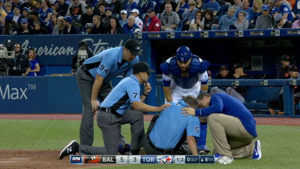 Video: MLB Umpire Floored by Brutal Stray Ball to the Head