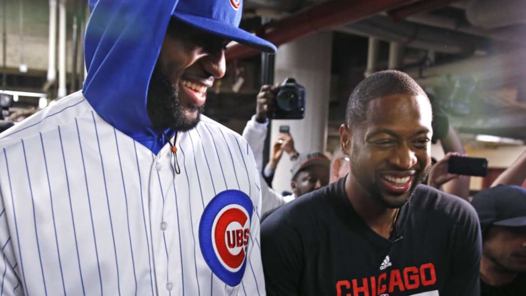 LeBron James reps a Cubs uniform after losing a bet