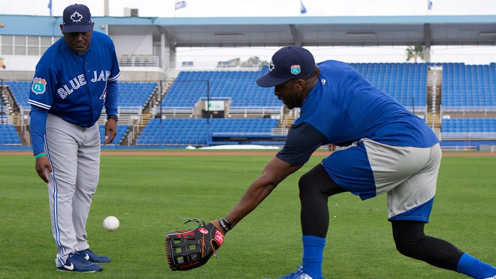 Tim Raines works with the Blue Jays' outfielders during Spring Training. (AP)