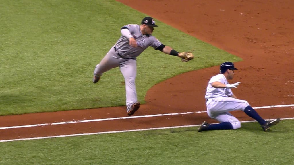 Bourjos evades the tag at first