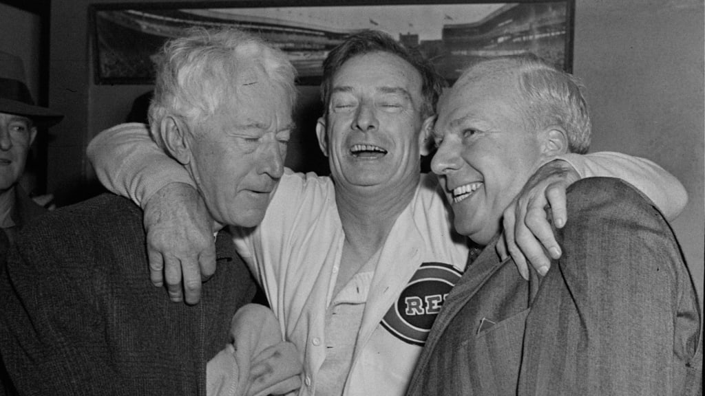From left: Commissioner Judge Landis, Reds manager Bill McKechnie and Warren Giles embrace after Cincinnati won the 1940 World Series.