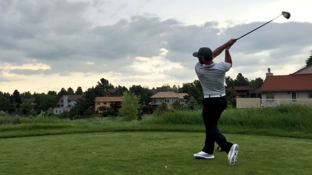 Daniel Descalo unleashes a perfect golf swing on Monday. (Rockies)