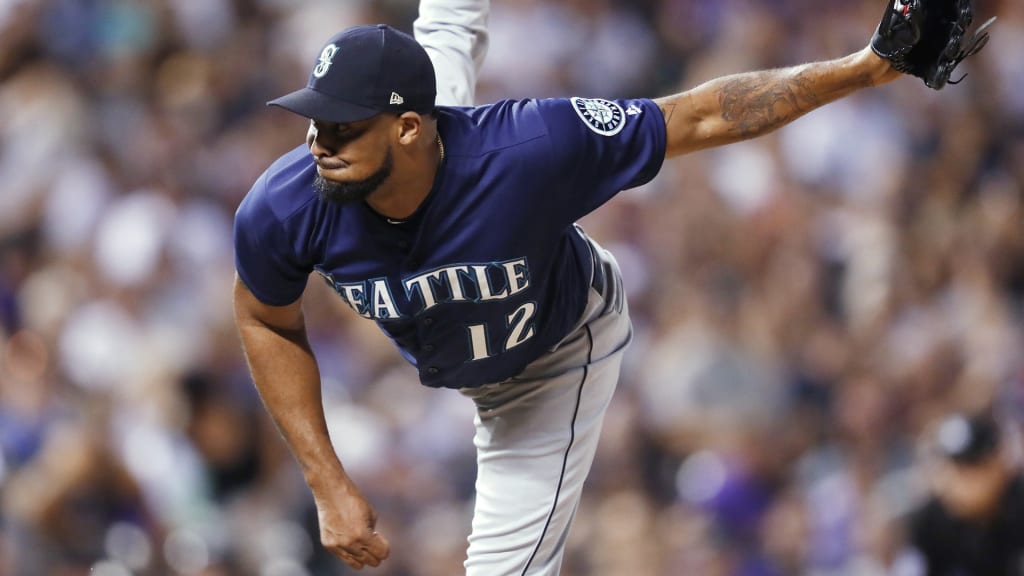 Seattle Mariners relief pitcher Juan Nicasio works against a Colorado Rockies batter during the eighth inning of a baseball game Saturday, July 14, 2018, in Denver. Colorado won 4-1. (AP Photo/David Zalubowski)