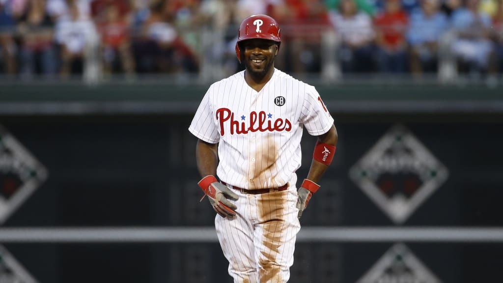 Philadelphia Phillies' Jimmy Rollins smiles after a steal during a baseball game against the Washington Nationals, Monday, Aug. 25, 2014, in Philadelphia. (AP Photo/Matt Slocum)