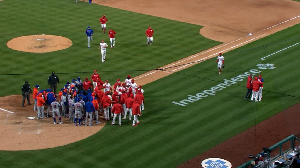 Cincinnati Reds and Chicago Cubs clear the benches extending 3
