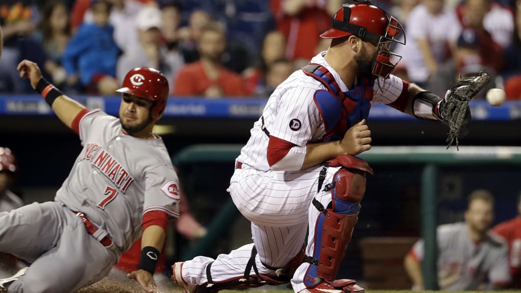 Cameron Rupp debuted a wristband during Friday's game that had hot and cold zones for Reds' hitters among other data. (AP)