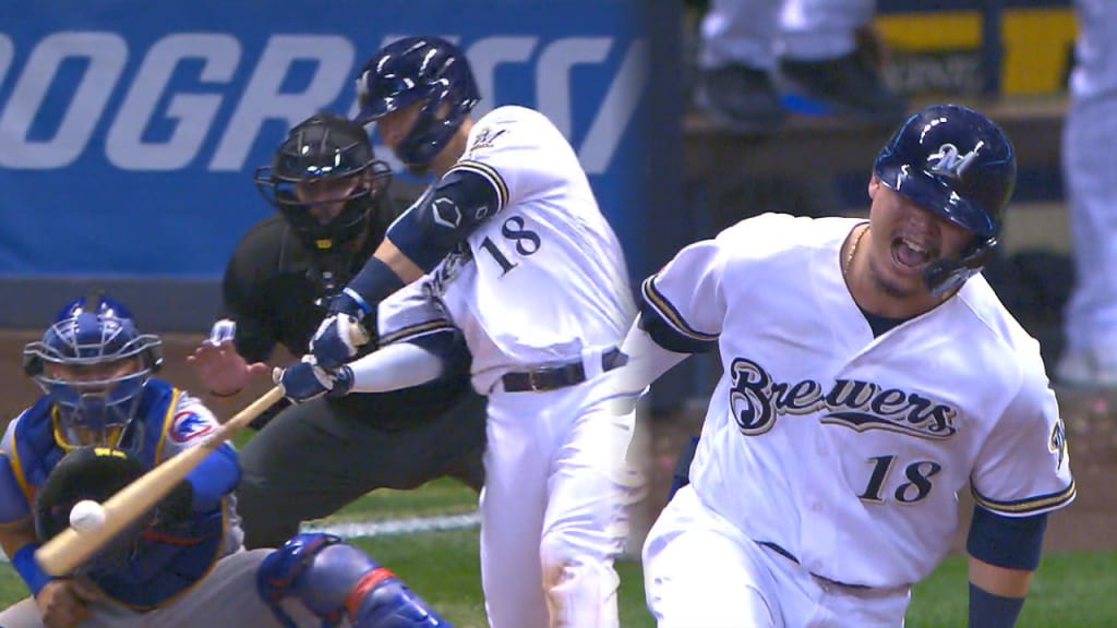 Images from the Brewers' 15-14 victory over the Nationals in 14 innings