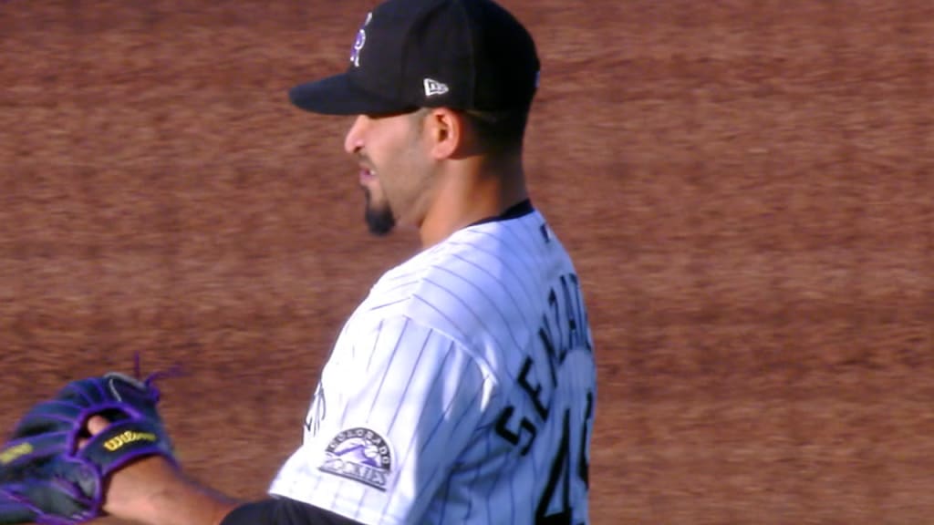 Elias Diaz of the Colorado Rockies celebrates with Brendan Rodgers