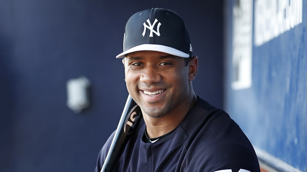 Russell Wilson Dons New York Yankees Uniform