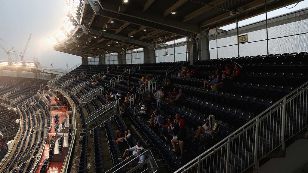 Fans waited one hour and 55 minutes after the scheduled first pitch before the game was called. (Getty)