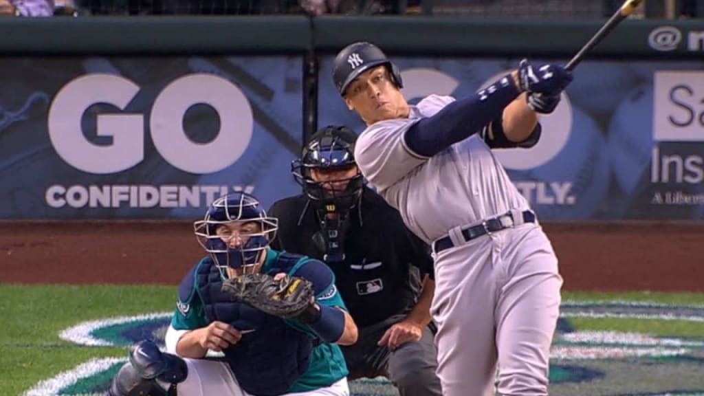 Injured New York Yankees outfielder Aaron Judge spits a seed as he watches  from the dugout during the fourth inning of a baseball game against the  Seattle Mariners, Saturday, Sept. 8, 2018