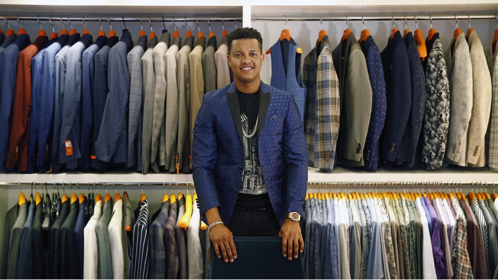 Look good, feel good, play good. Whether he's in designer clothes or Yankees pinstripes, Castro has cut a sharp figure since arriving in New York prior to the 2016 season, and he couldn't be happier. "I've never had as much fun with any other team I've been on," he says. (New York Yankees)