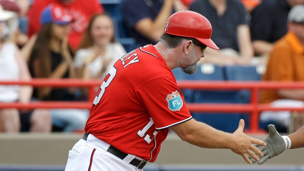 Nationals third-base coach Bobby Henley returned to wearing No. 13 this season. (AP)
