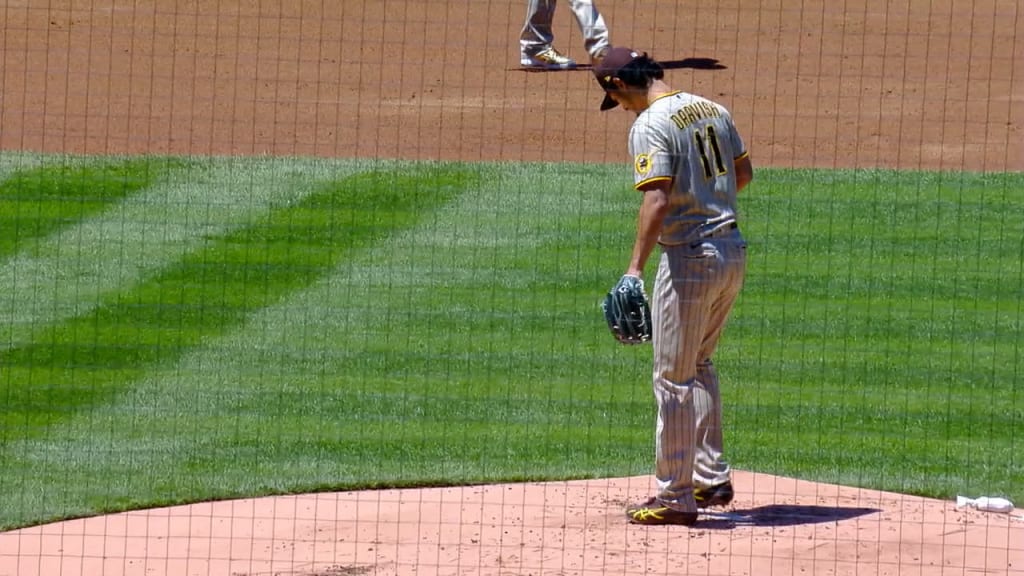 San Diego Padres' Victor Caratini heads up the first-base line after  connecting for a grand slam off Colorado Rockies relief pitcher Robert  Stephenson in the sixth inning of game one of a