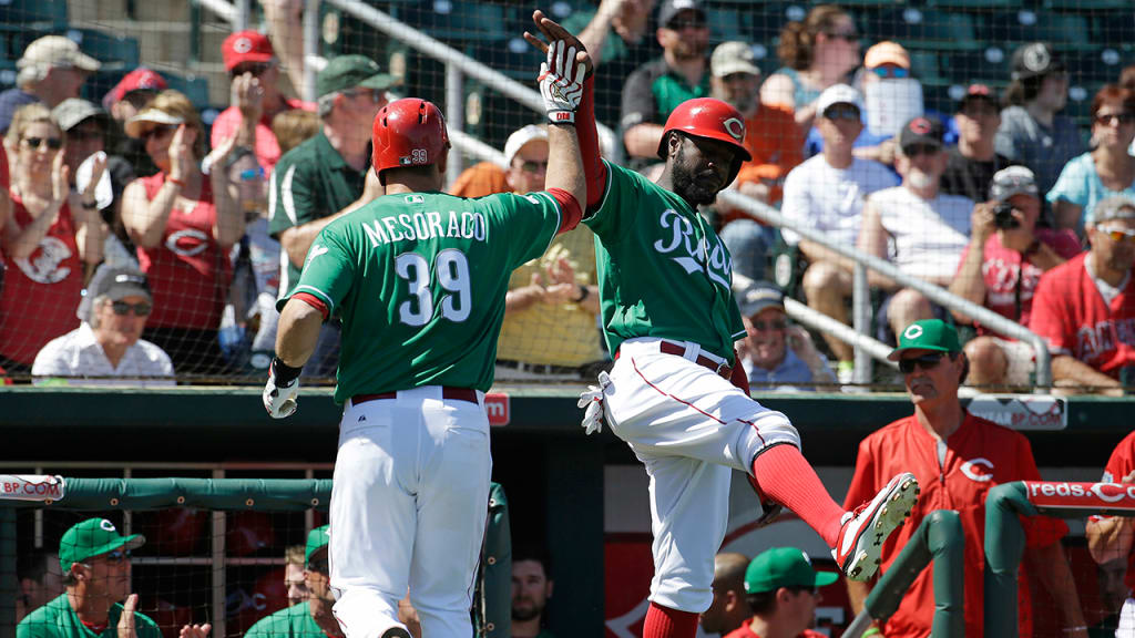 Devin Mesoraco and Brandon Phillips celebrate after Mesoraco drove in Phillips with a first-inning homer. (AP)