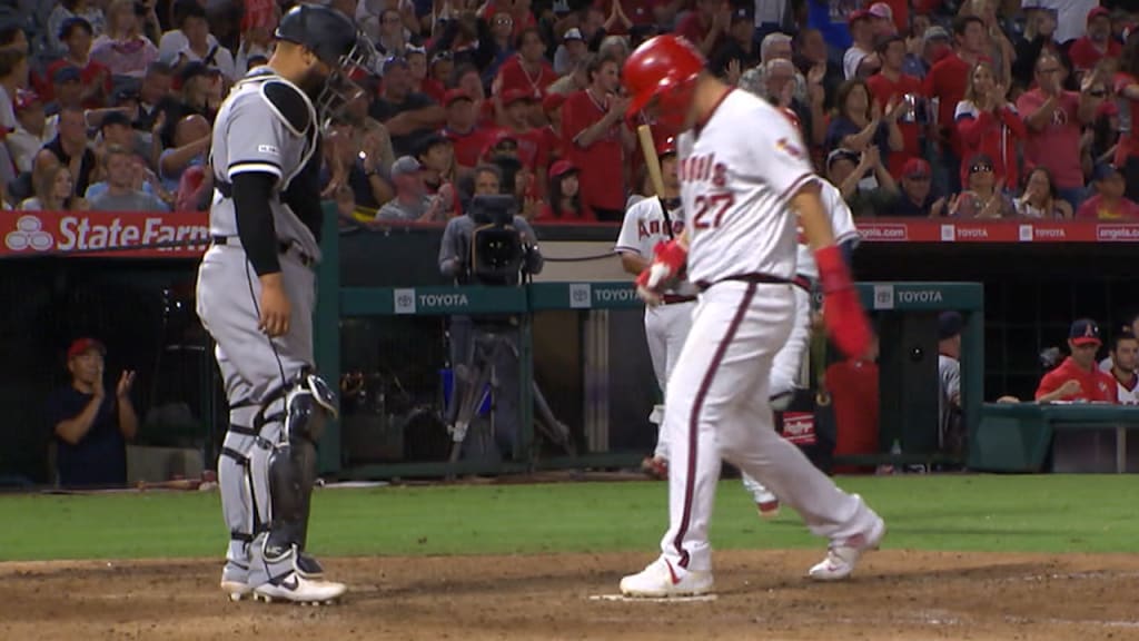 Photo: Angels' Mike Trout smiles after drawing a walk