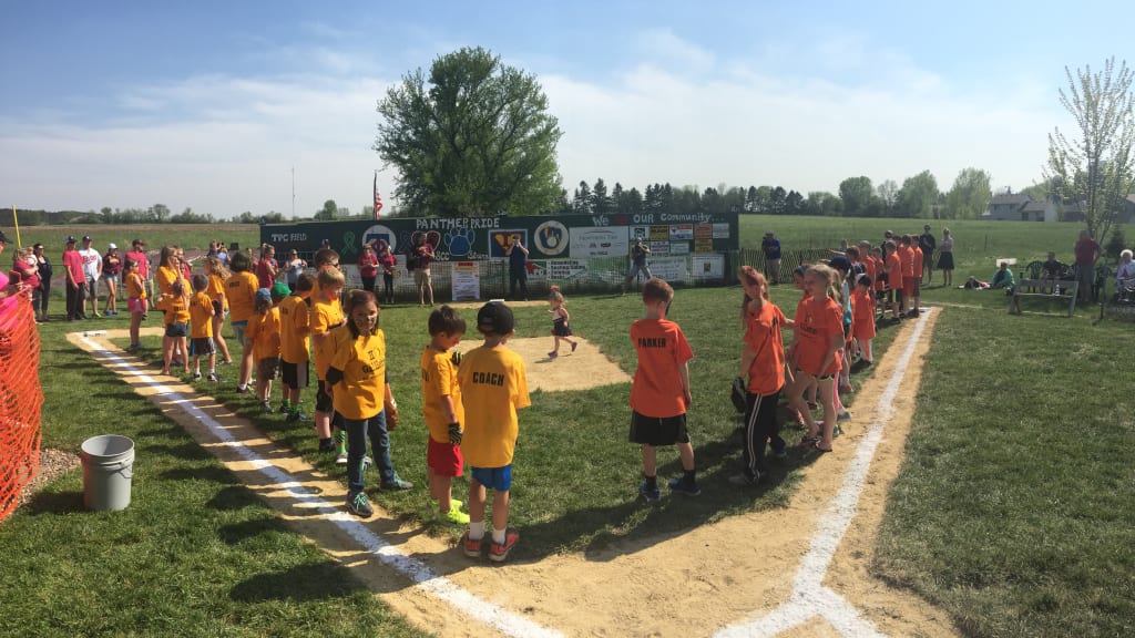 Nick and Leah Feyereisen built a field in their backyard so their boys could play baseball. (Rhett Bollinger)