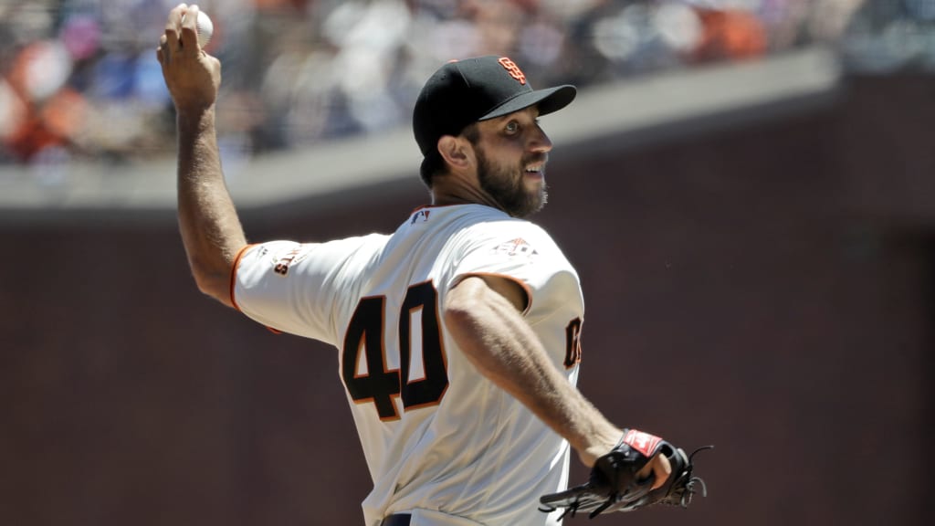 San Francisco Giants starting pitcher Madison Bumgarner throws to the St. Louis Cardinals during the first inning of a baseball game Sunday, July 8, 2018, in San Francisco. (AP Photo/Marcio Jose Sanchez)