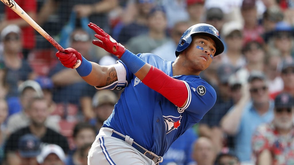 Toronto Blue Jays' Yangervis Solarte watches a hit against the Boston Red Sox during the ninth inning of a baseball game Saturday, July 14, 2018, in Boston. (AP Photo/Winslow Townson)