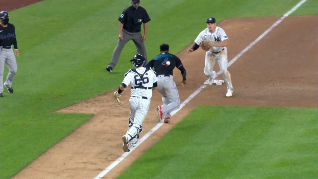Harrison safe at third on error